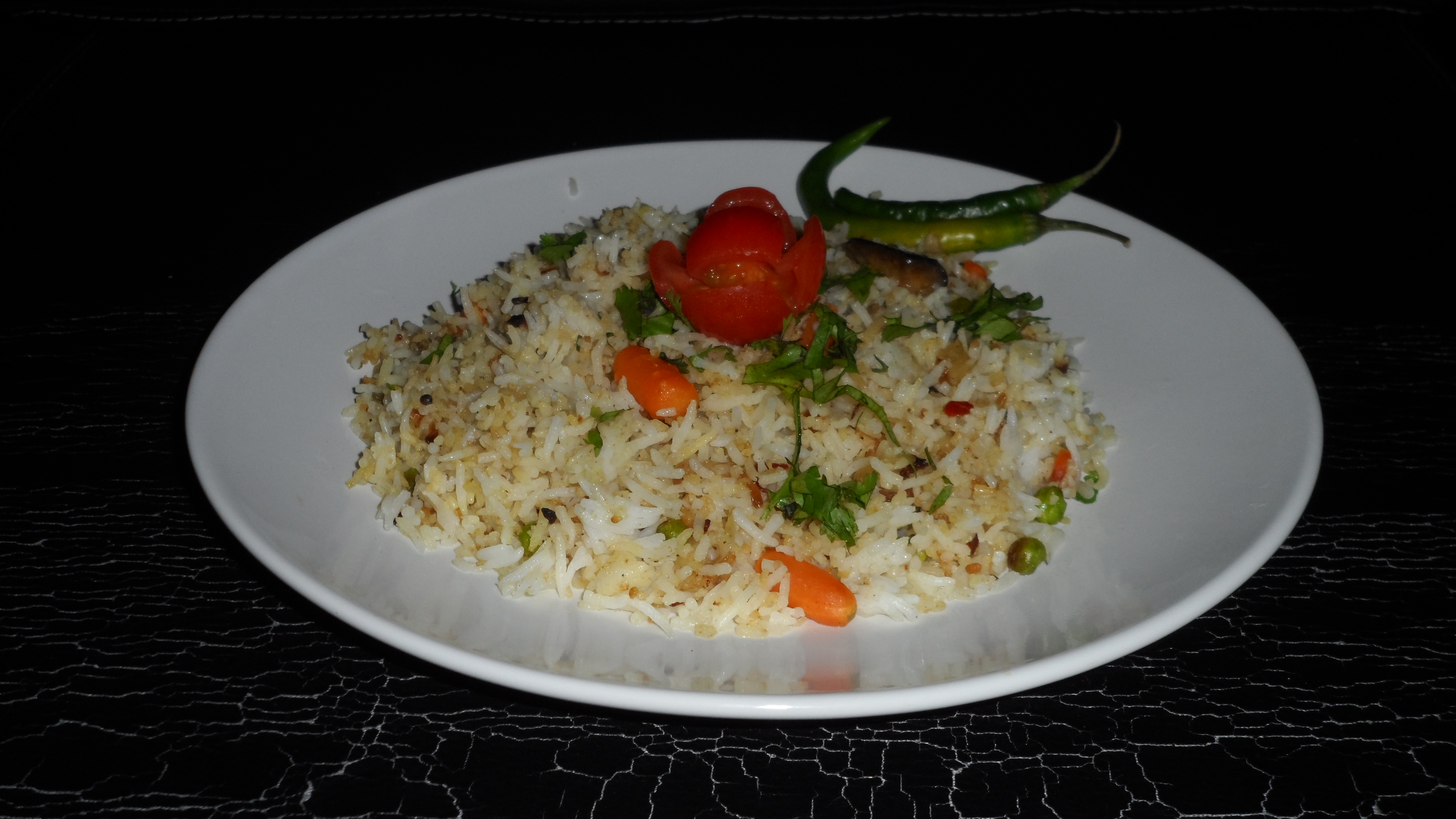 Vegetable biryani with saffron rice, herbs, and browned onion, Natural window light, ivory linen, handmade ceramic, shallow depth of field, no text, no logo, no watermark, fine-dining magazine photograph. Vegetable Biryani